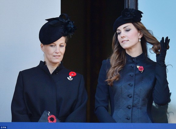 Daily Mail: The Duchess of Cambridge (right) plays with her hair as stands with Sophie, Countess of Wessex, on a balcony overlooking Whitehall's Cenotaph"