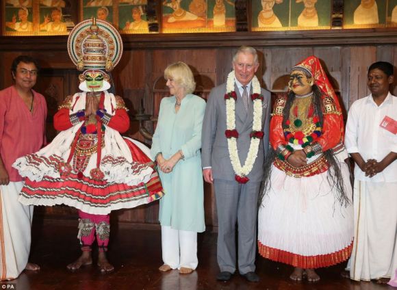 Prince Charles and Camilla meet dancers from the Kerala Folklore Theatre and Museum after a performance in Kochi